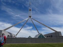 Randall on Parliament House roof with flagpole